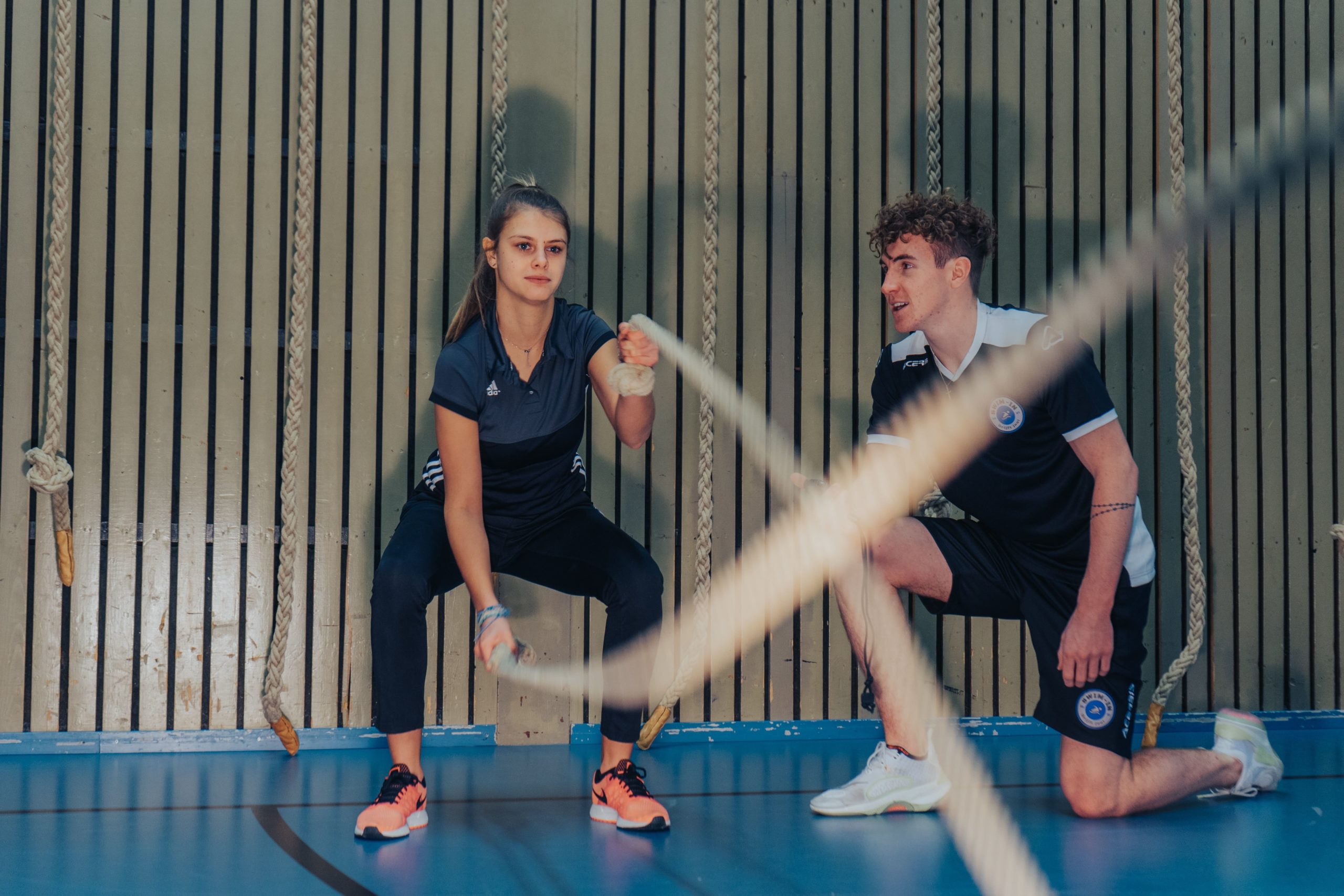 Sports coach mentoring athlete